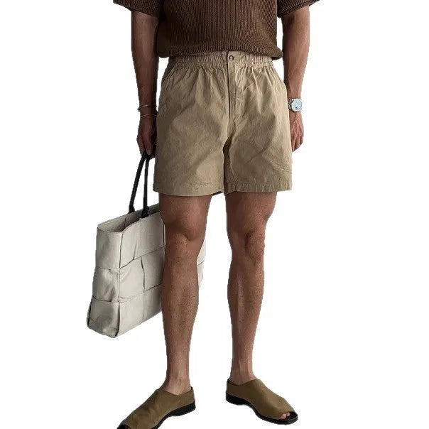 Cotton loose fit sports shorts in black, white, and khaki colours for summer athletic wear