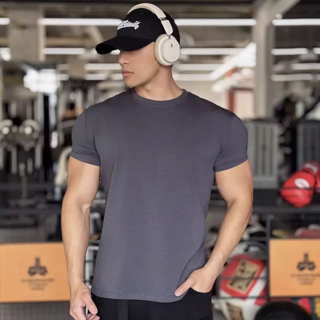Men's solid colour slim fit polyester short sleeve sports t-shirt in black, front view