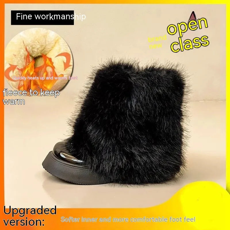 Women's black fleece-lined low-top snow boots with a waterproof rubber platform sole on a white background.