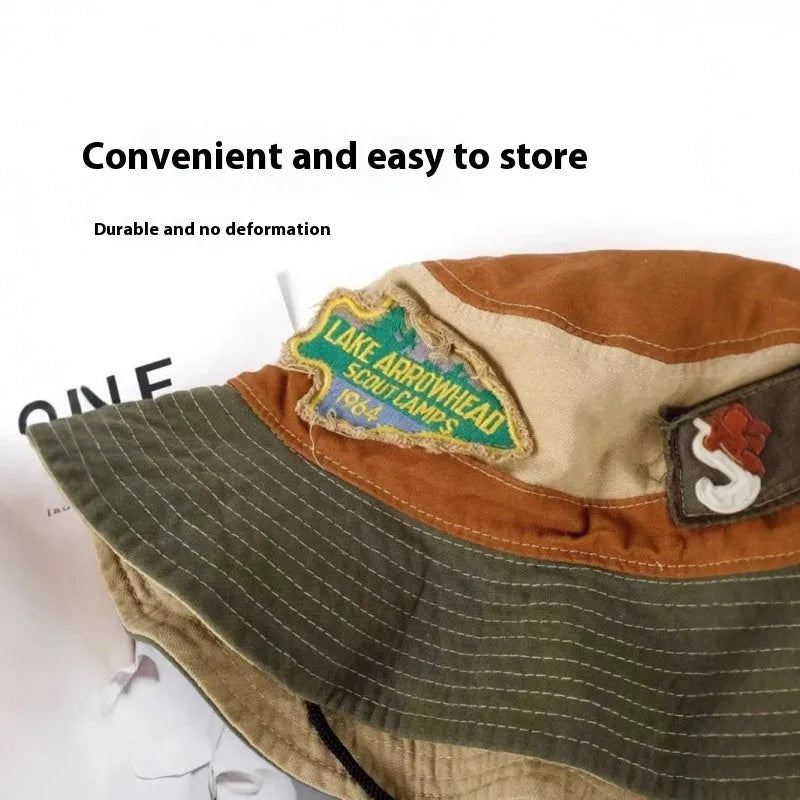 Army green cotton fisherman hat with retro patchwork design and flat top crown for summer sun protection