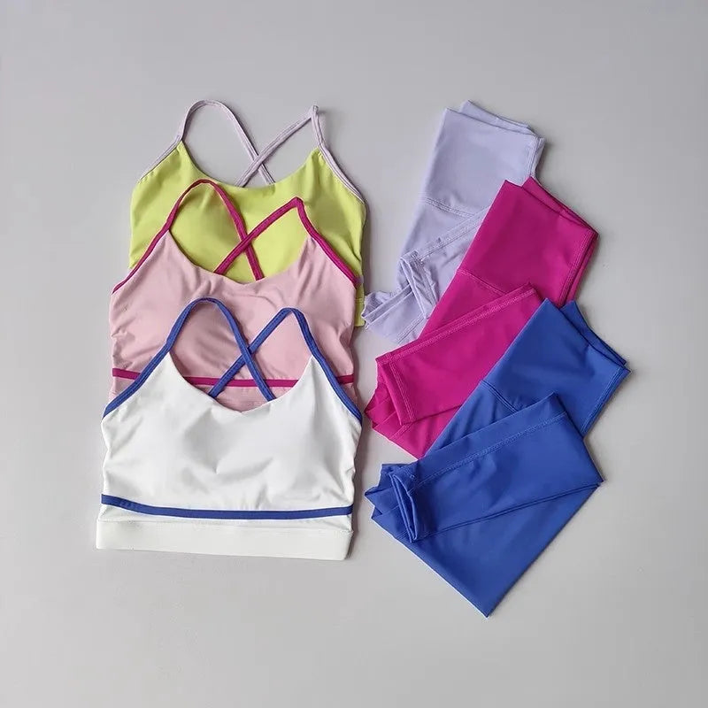 Women's blue and white quick-drying yoga set with sleeveless tank top and cropped pants