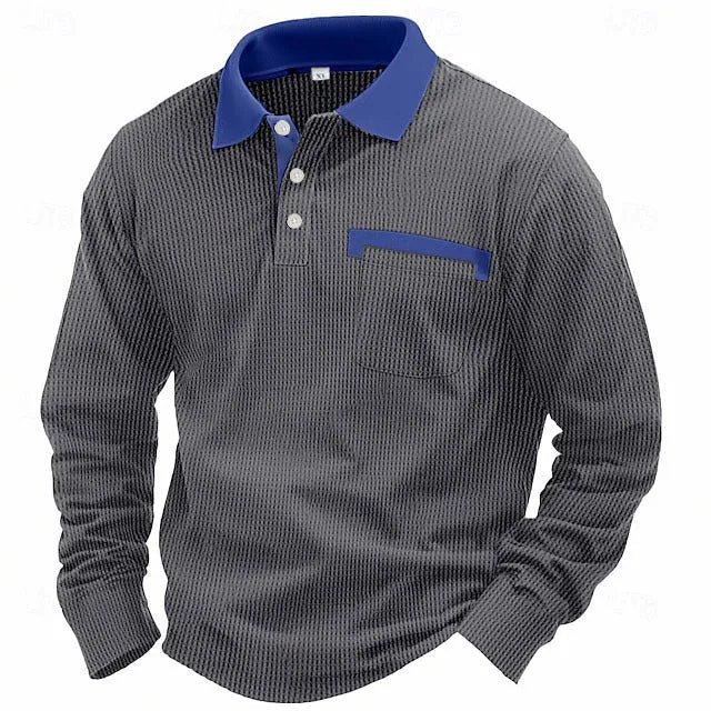Man wearing a dark green waffle-knit long-sleeved polo shirt with an asymmetric design detail.