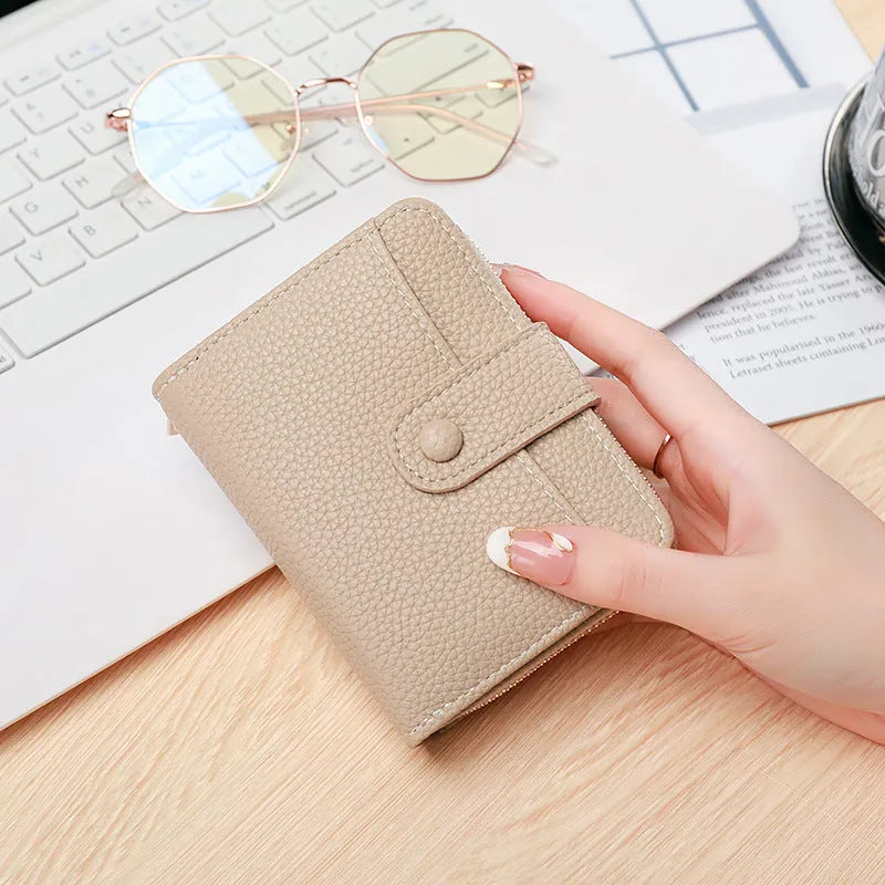 Women's lychee pattern anti-bacterial short wallet in PU leather