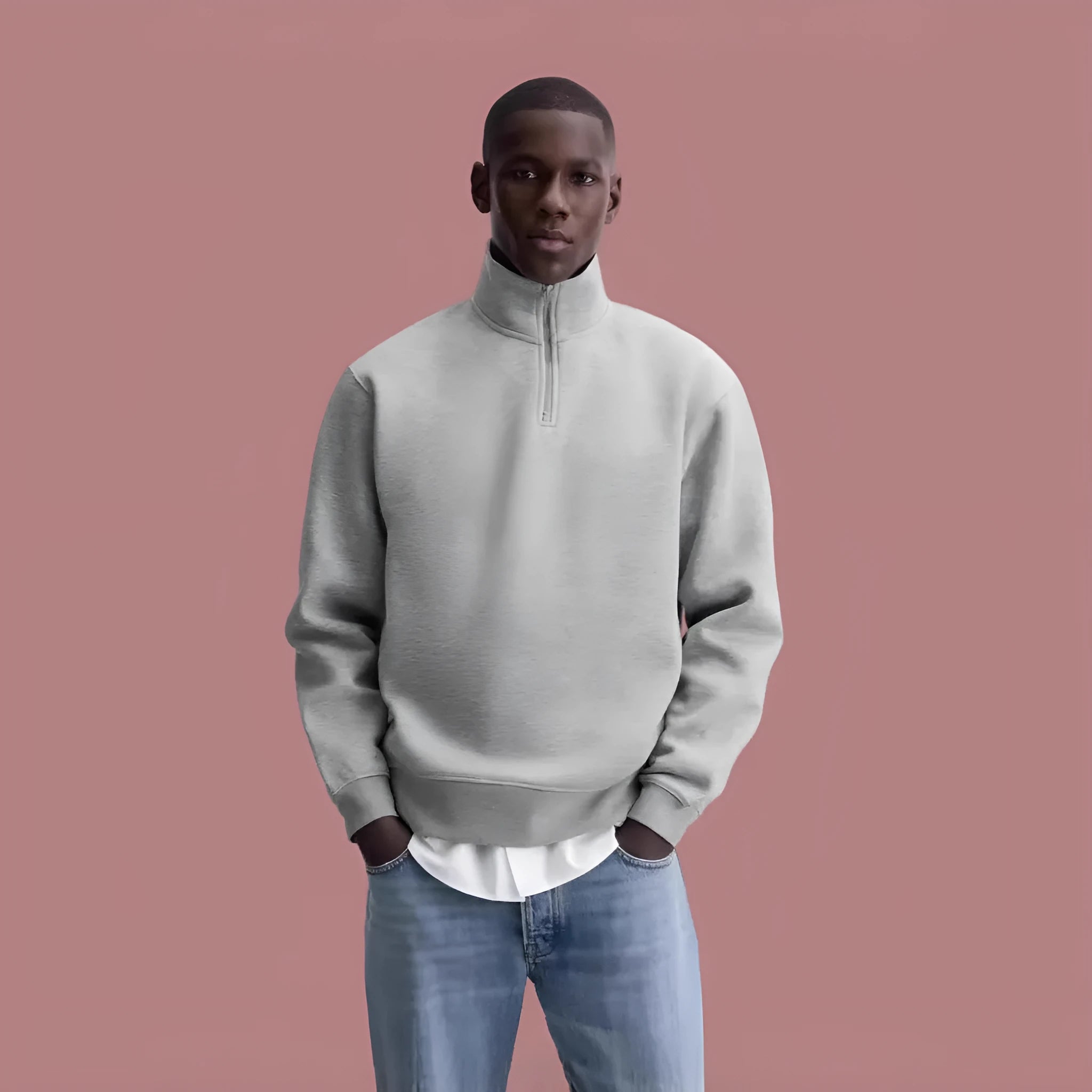 Grey unisex half-zip stand collar cotton sweater on a hanger.
