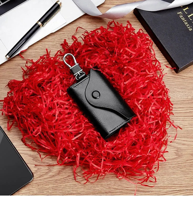 Genuine leather keychain card holder in a square vertical shape, shown in black with sequin details.