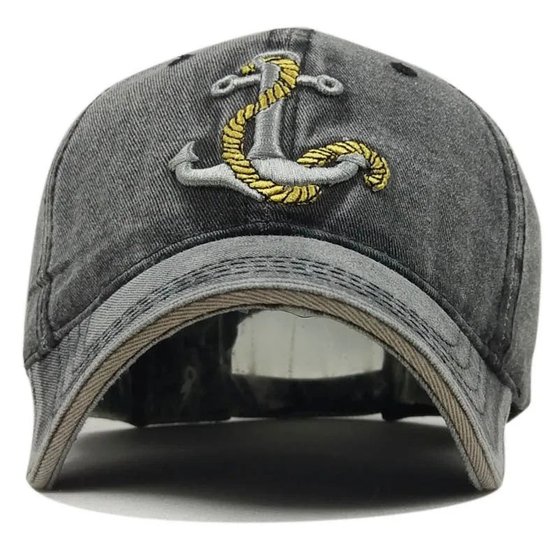 Cotton baseball cap with embroidered anchor design in red, khaki, black, and navy colour options.