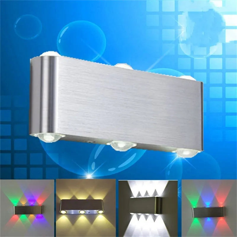 Silver aluminium rectangular LED wall lamp with multicolour lighting options on bedroom wall