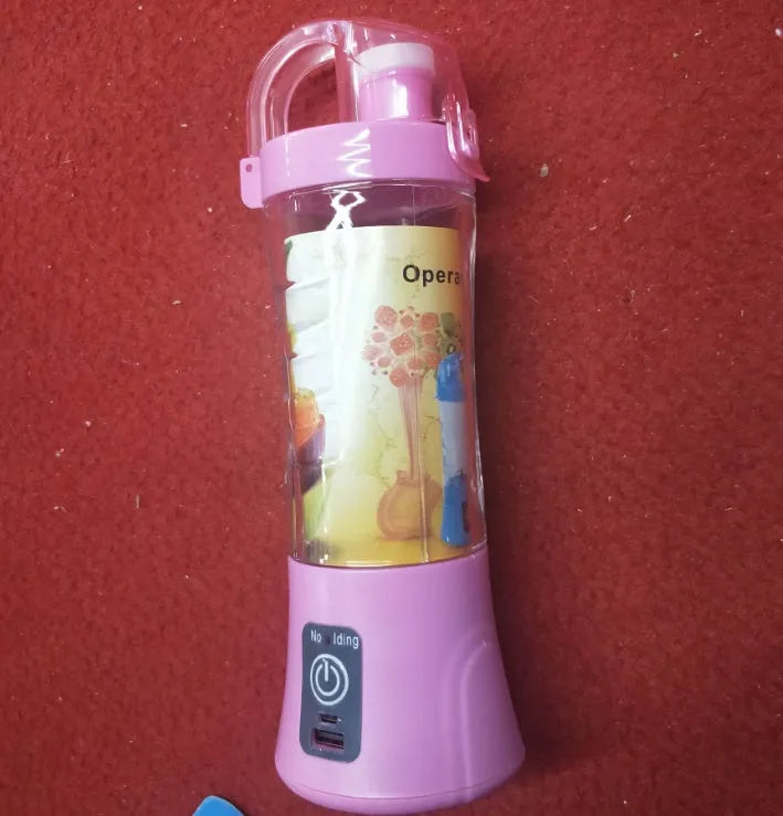 Blue handheld electric fruit juicer with USB charging port and 400ml capacity measurement