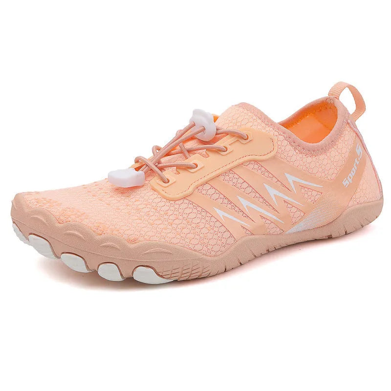 Low-top river tracing shoes in mesh with rubber sole, shown in apricot colour.