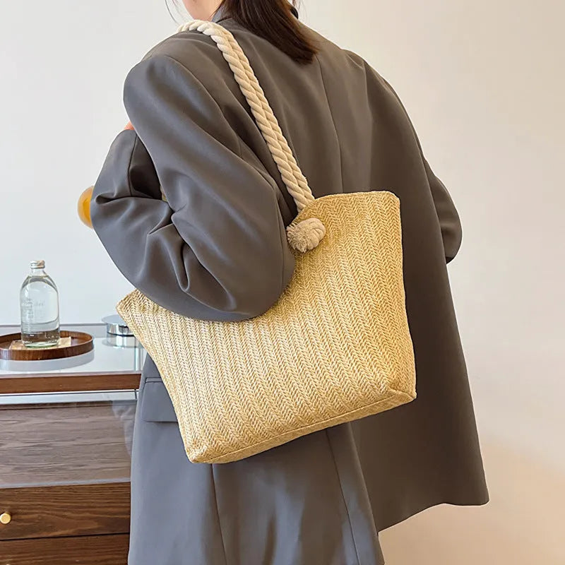 Womens straw large capacity shoulder handbag in khaki with synthetic leather lining and single strap