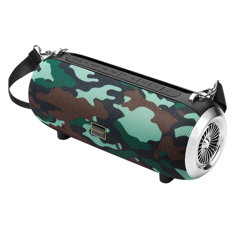 F666 portable Bluetooth speaker with fabric mesh finish, shoulder strap, and display showing FM radio frequency.