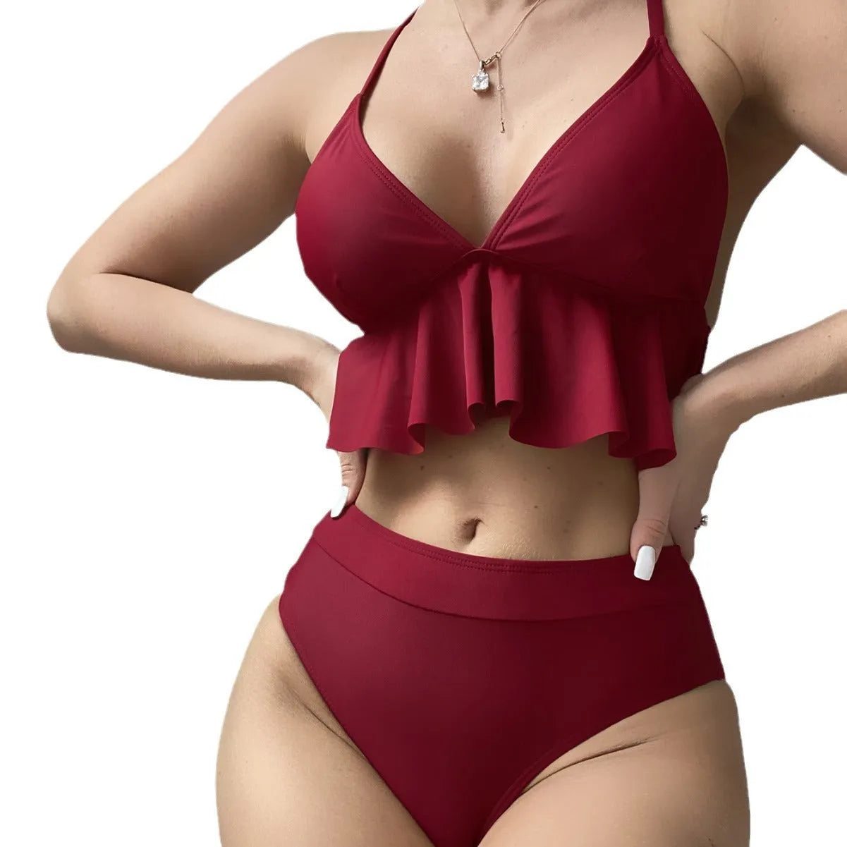 Women's solid colour bikini swimsuit showing sleeveless top and pants in available colours.