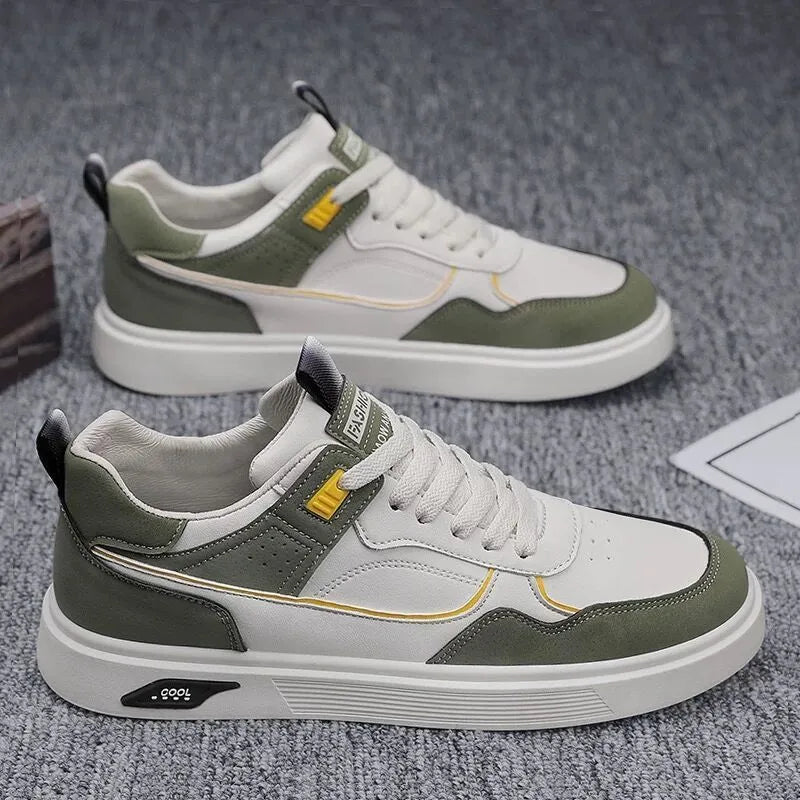 Men's low-top canvas board shoes in beige with leather stitching detail on a white background.