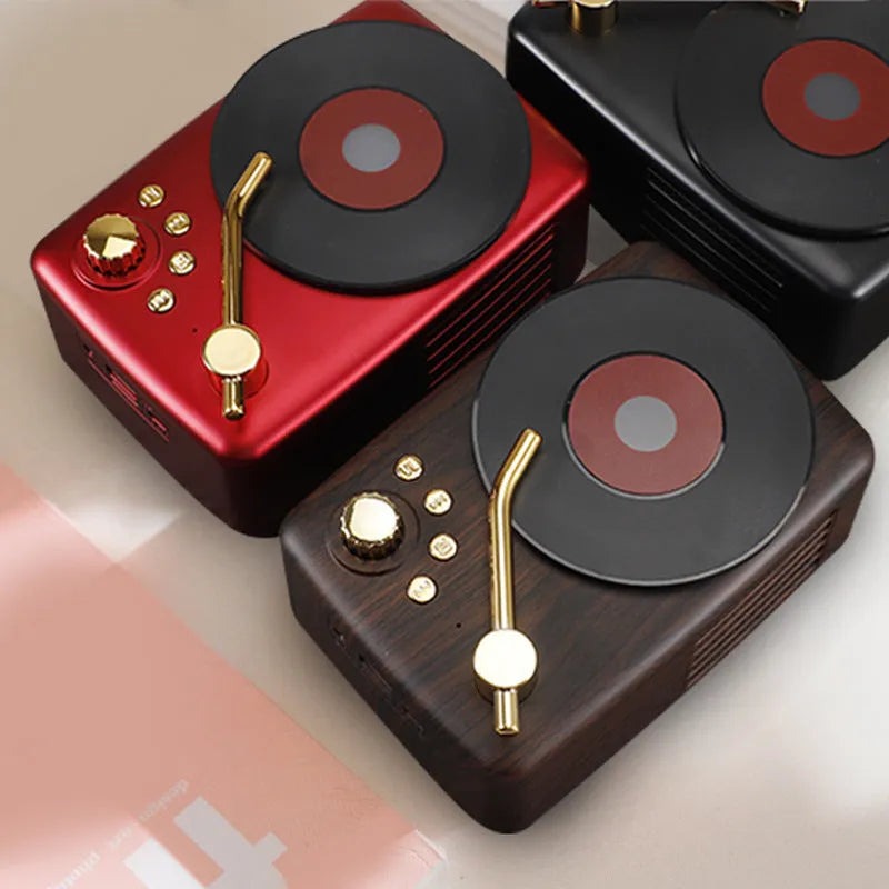 T12 portable record player in Black, Bronze, and Red colour options with Bluetooth 5.0