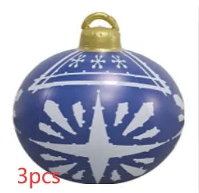 Large red and white striped inflatable Christmas ball ornament hanging on an outdoor tree