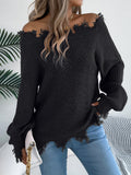 White cut-off-shoulder pullover sweater with hollow-out long sleeves on a mannequin.