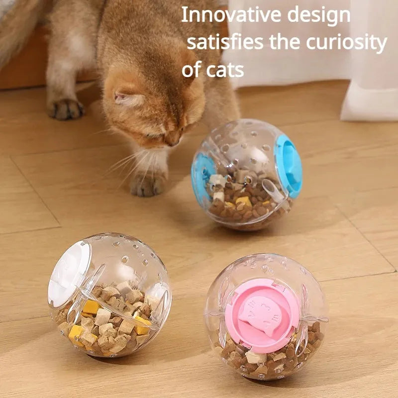 Clear blue ABS plastic slow feeder ball for cats, 11.5cm in diameter, on a wooden floor.
