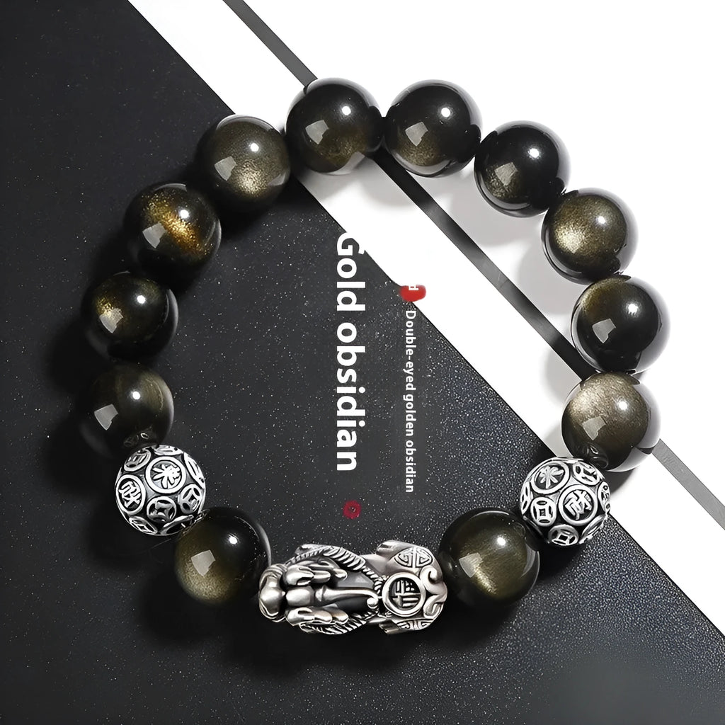 Men's geometric obsidian and sterling silver bracelet showing polished stones and metallic framework
