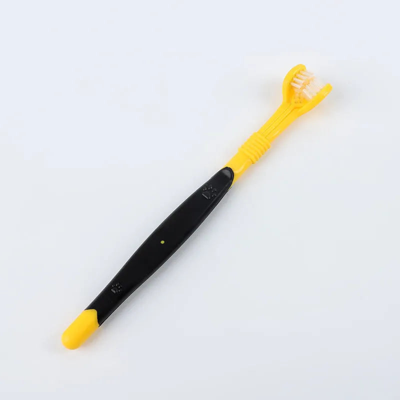 Pet toothbrush with nylon bristles and plastic handle in green colour