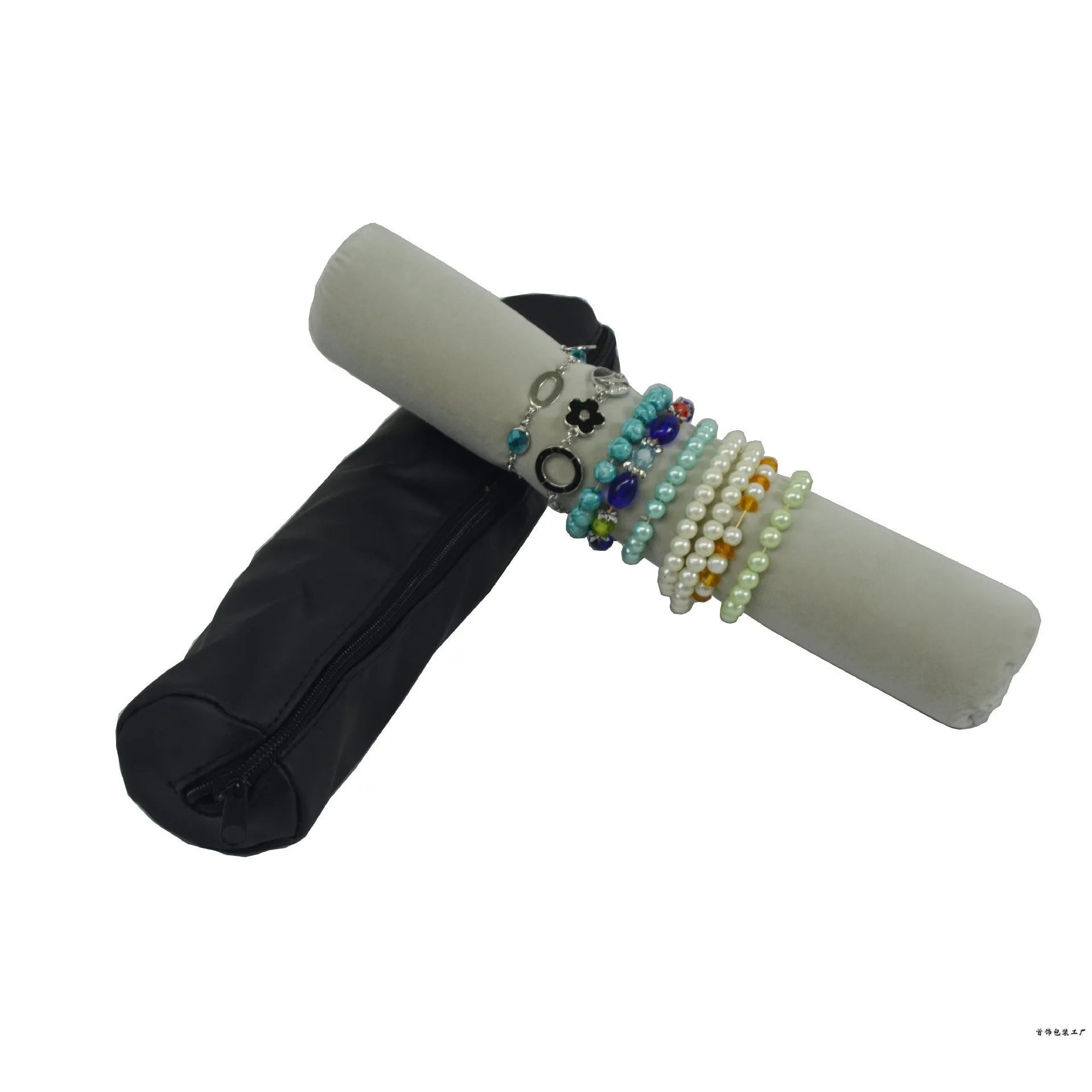 Portable bracelet watch storage bag in black leather with black bracelet stick on a flat surface