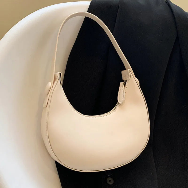 Retro women's dumpling-shaped shoulder bag in PU material with zippered compartment