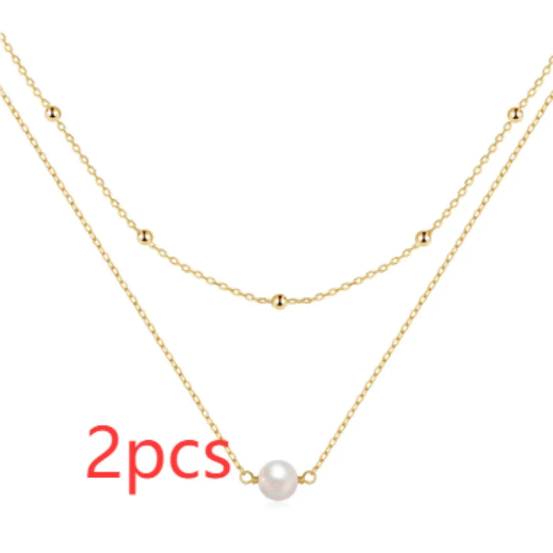 S925 sterling silver women's necklace with double-layer design and twin pearls in gold or white gold plating