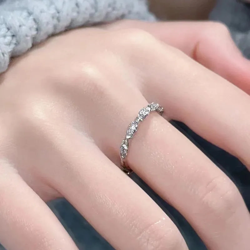 S999 sterling silver winding love ring in white gold colour with inlaid zircon for women
