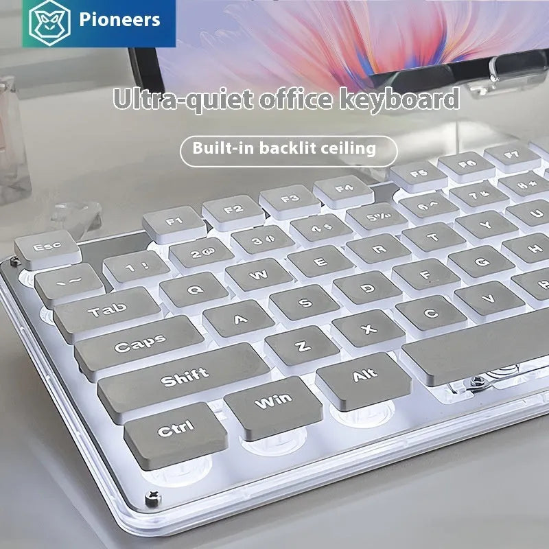Wired mute keyboard with mechanical feel, ABS construction, 44x13x2cm, white light variant on desk