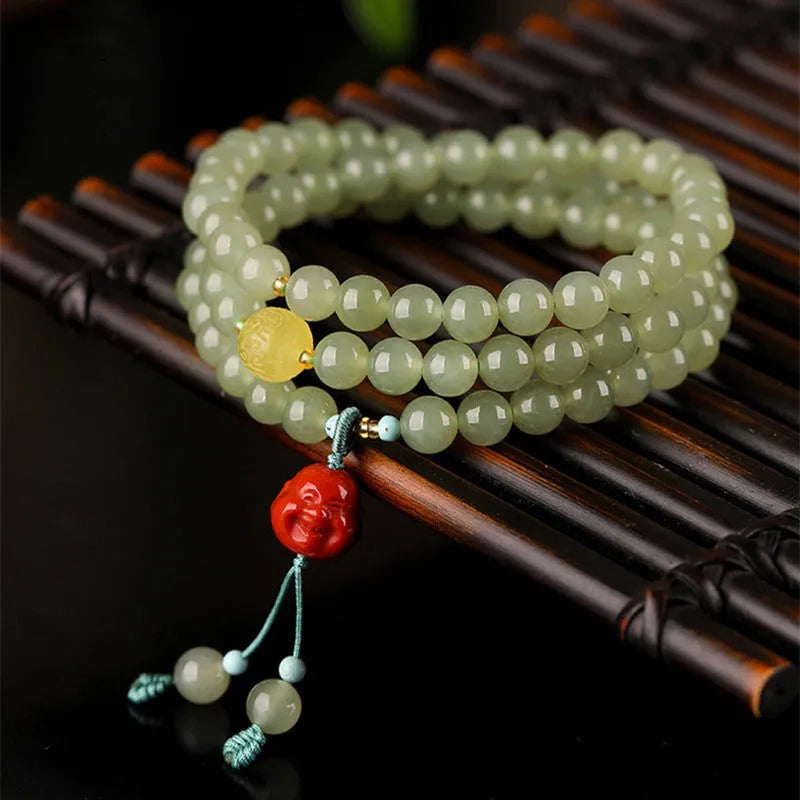 Pale blue Hetian jade bracelet with 6mm beads in three circle pattern
