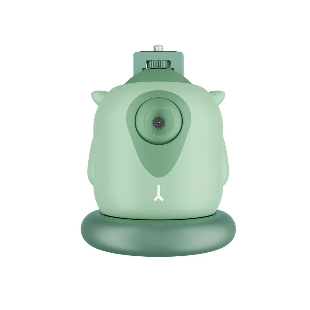 Dark green intelligent gimbal with AI face tracking and 360-degree rotation on a tripod.