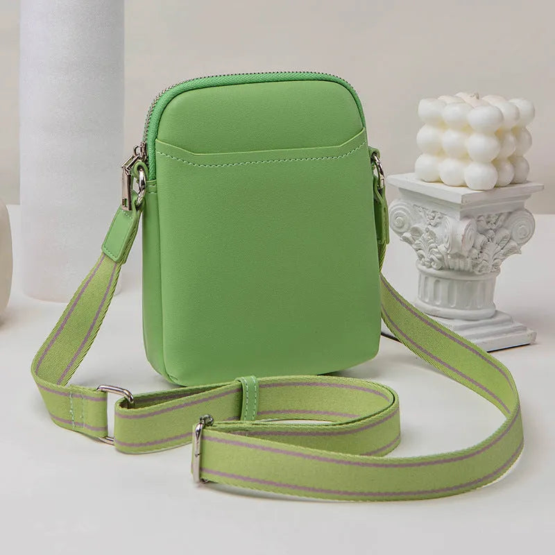 Solid colour mobile phone crossbody bag for women in black, beige, khaki, or green.