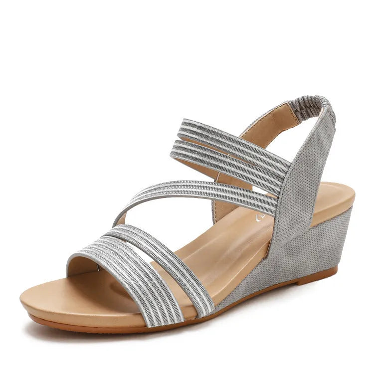 Women's platform sandals with soft leather bottom and middle heel in gold, grey, or pink