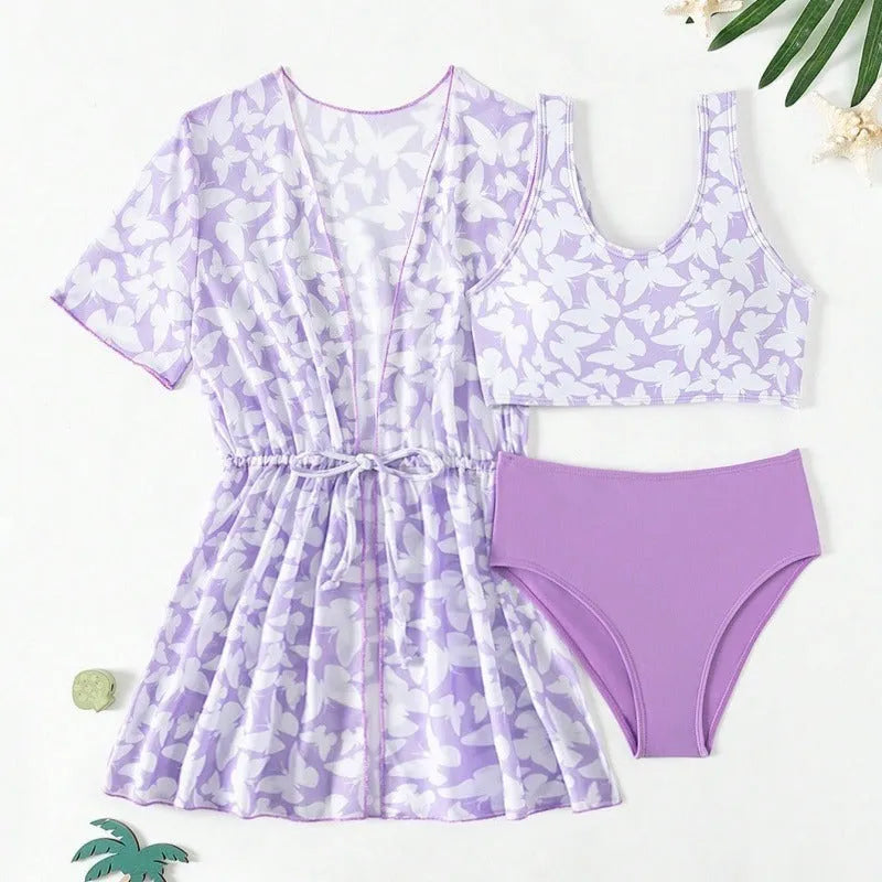 Girls three piece polyester swimsuit set comprising a coat, vest, and pants in colour 3218
