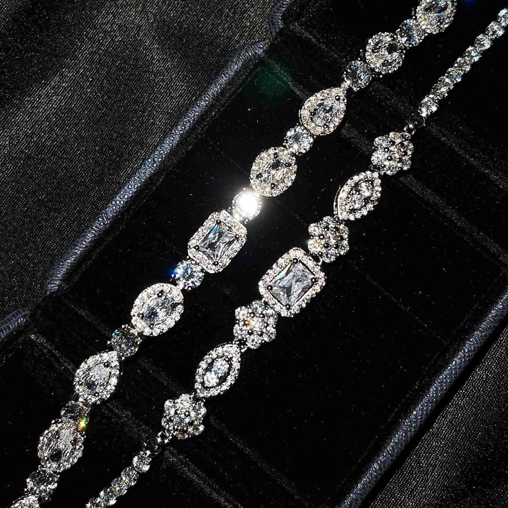 Women's geometric zircon bracelet with silver and white gold plating showing chain length options