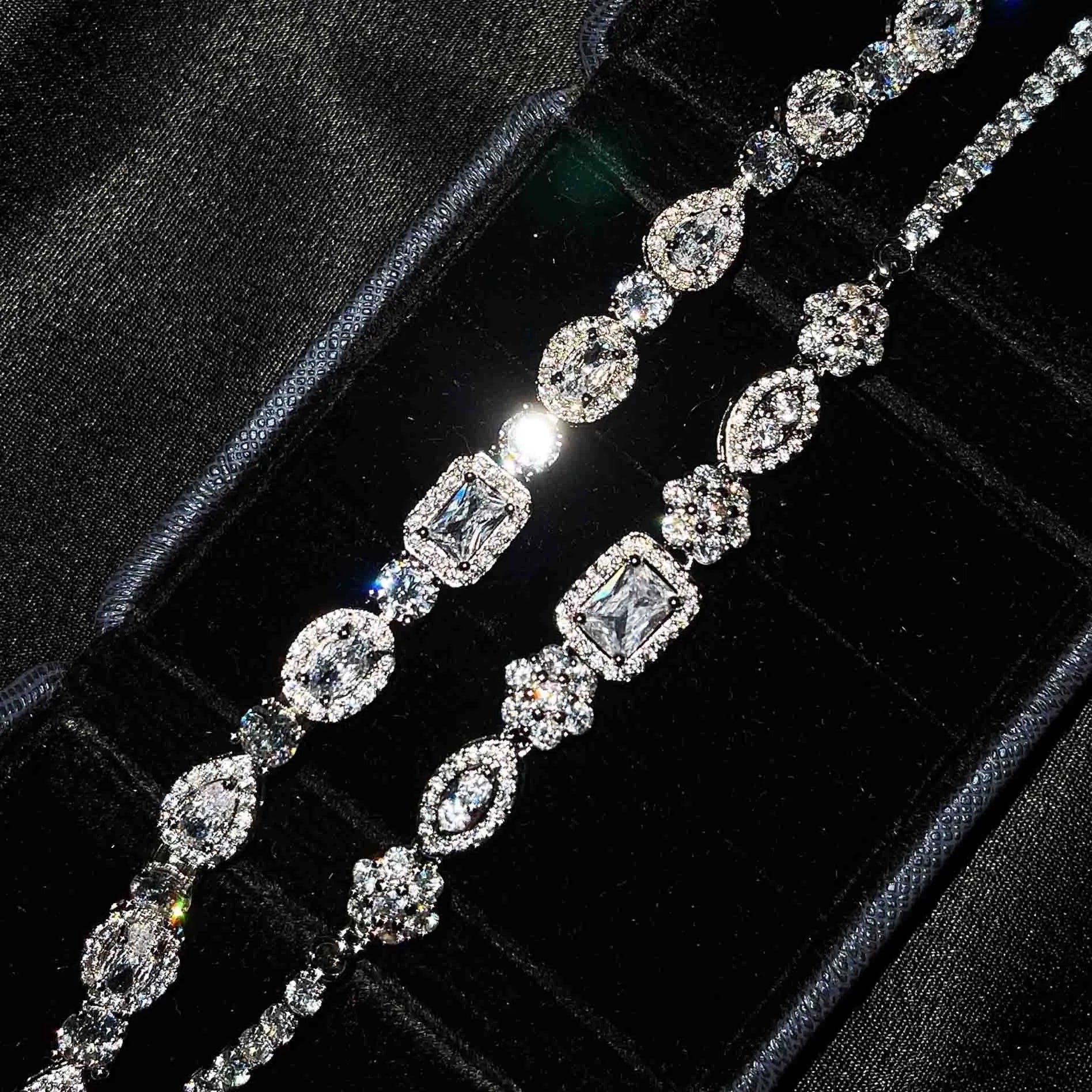 Women's geometric zircon bracelet with silver and white gold plating showing chain length options