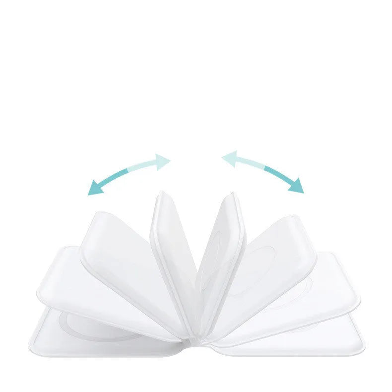 White foldable dual-pad magnetic wireless charging dock shown at an angle on a table.