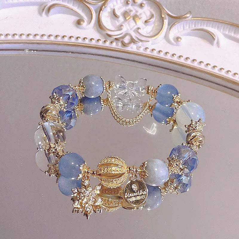 Women's galaxy colour bracelet with snowflake pendant, bow design, heart shape and cartoon character elements