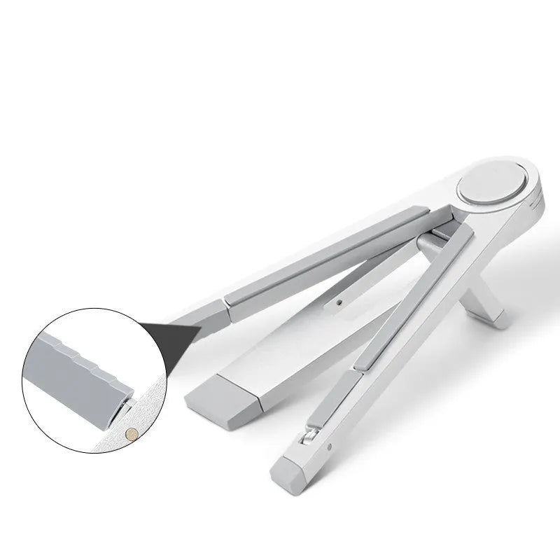 Silver metal adjustable triangle stand holding a mobile phone on a flat desktop