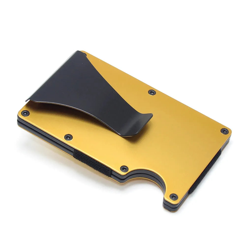 A slim carbon fibre card holder wallet in a geometric design, shown with business cards.