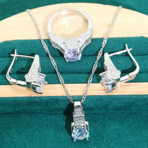 Bridal zircon alloy jewellery four-piece set showing necklace, earrings, ring and bracelet on water wave chain