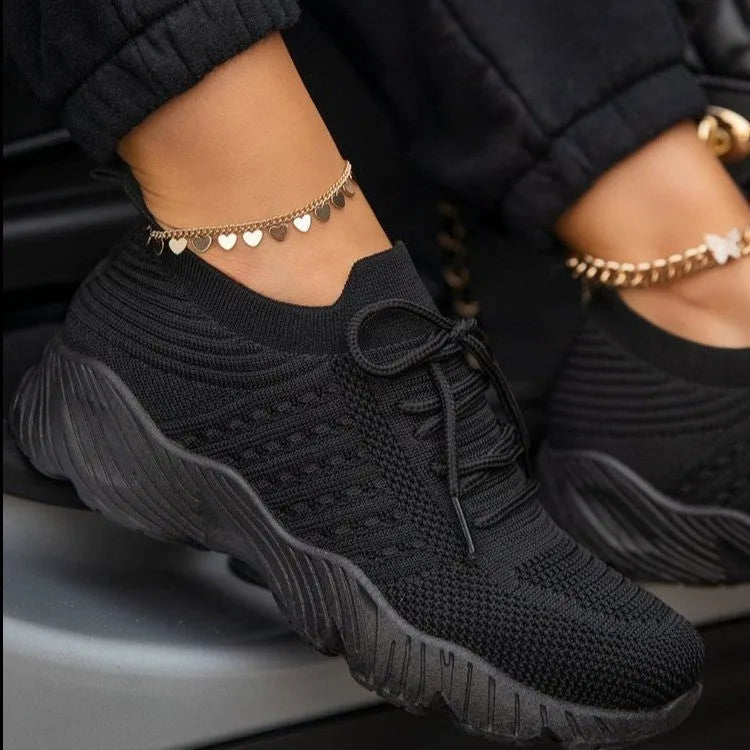 Women's solid colour chunky sneakers with a thick sole, shown in multiple colour options.