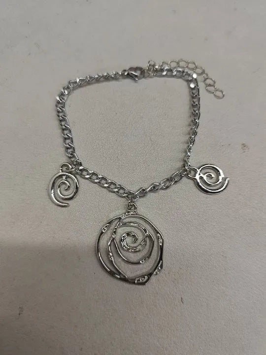 Spiral donut design jewellery set with necklace, bracelet and earrings in gold electroplated alloy