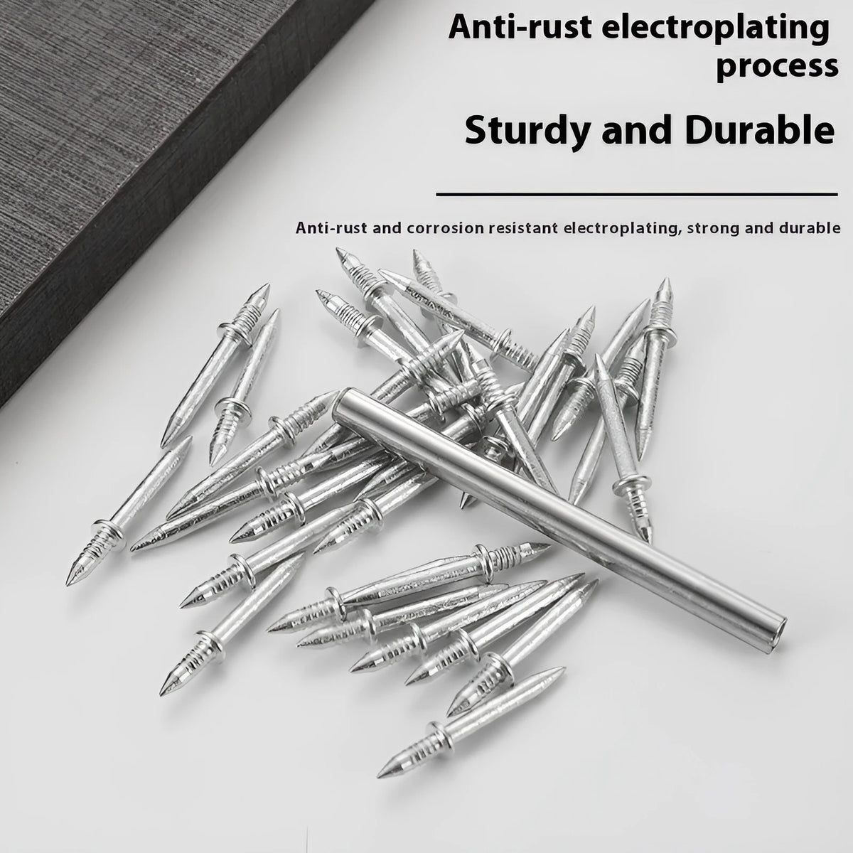 Double-headed galvanised nail with sleeve for skirting board screwless fixing