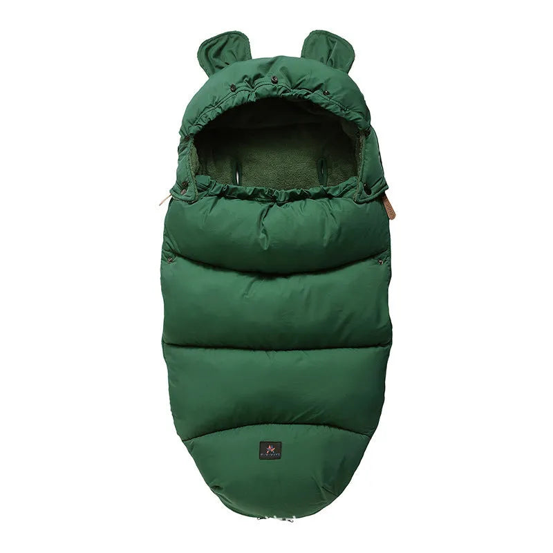 Convertible baby sleeping bag cocoon in a pram, showing cotton blend fabric and flannel lining.