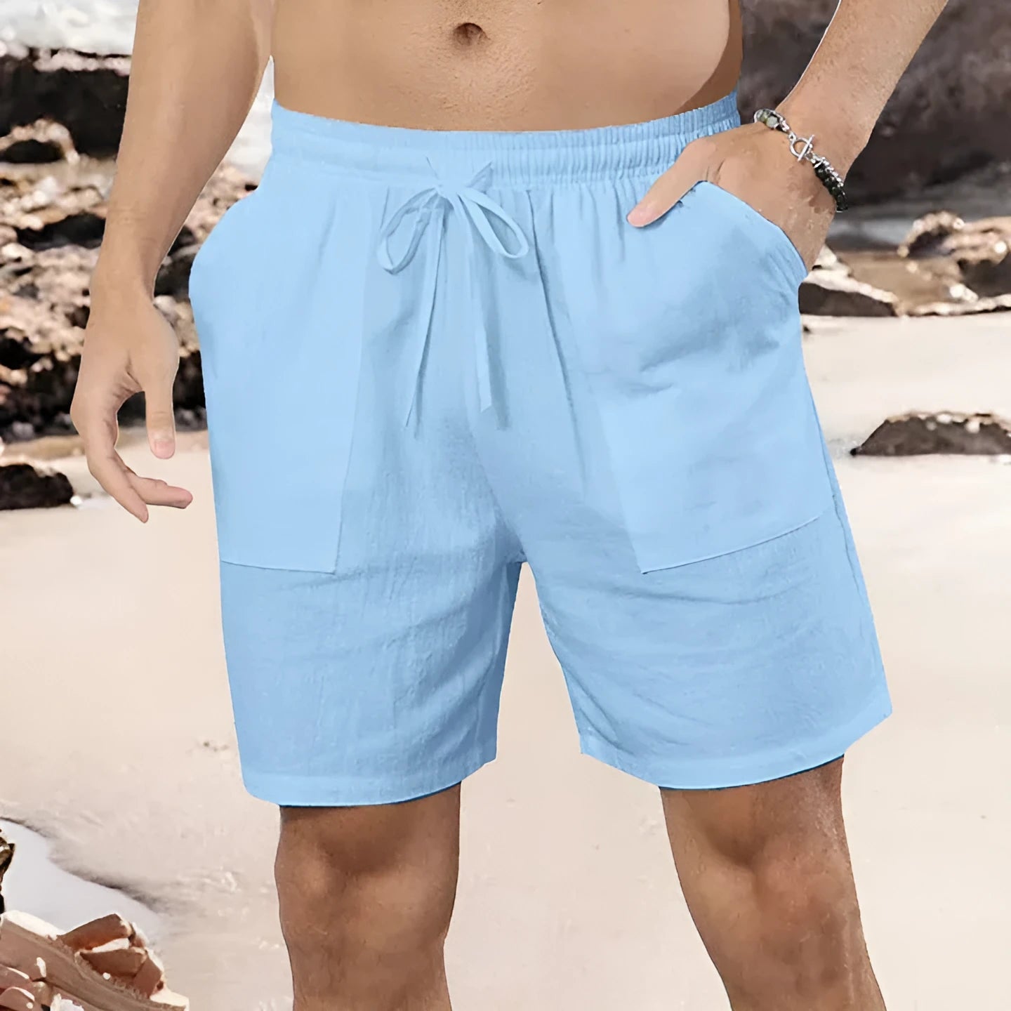 Men's light blue cotton linen straight-cut casual shorts on a hanger.