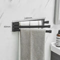 Black folding towel bar with no-drill installation for bathroom towel storage