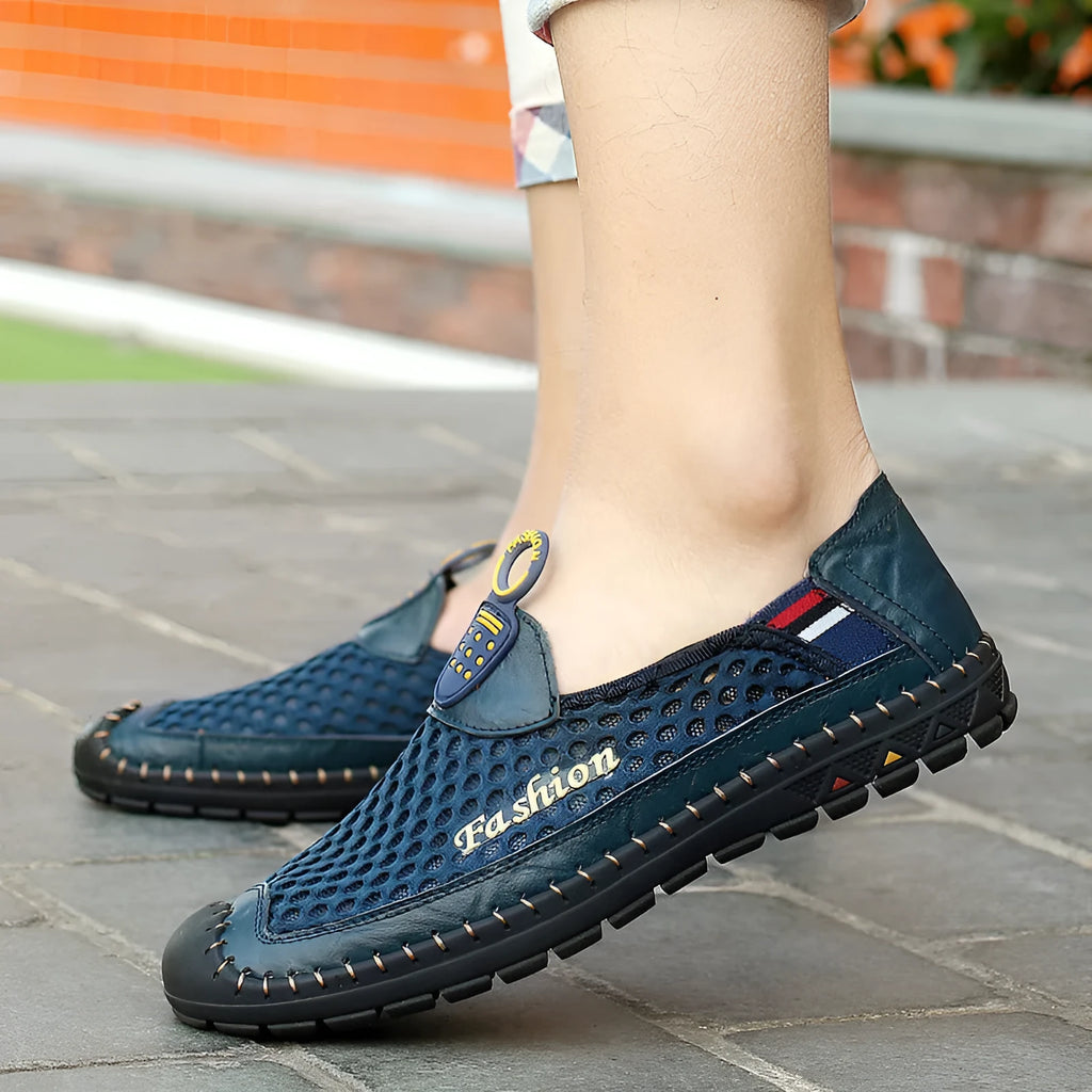 Mens brown casual shoes with mesh fabric uppers and rubber soles on a white background