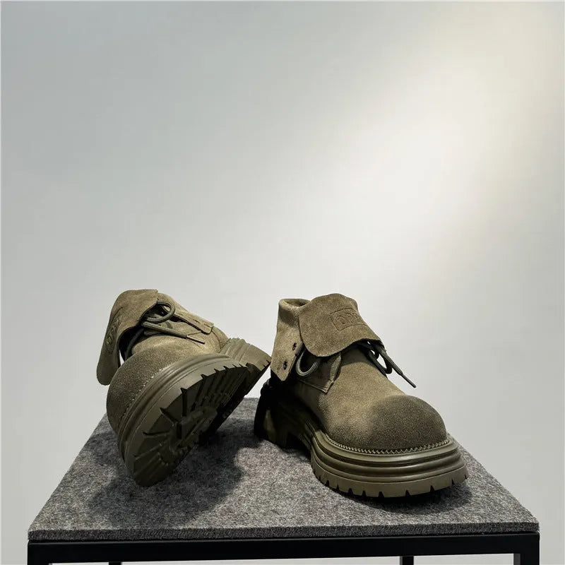 Retro distressed worker boots in cow suede with thick soles and low tube sock length