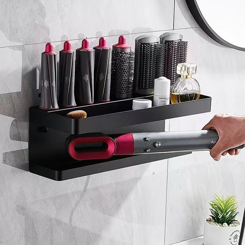 White double-layer aluminum bathroom storage rack with Marcel wave curlers organised on adhesive-mounted wall unit