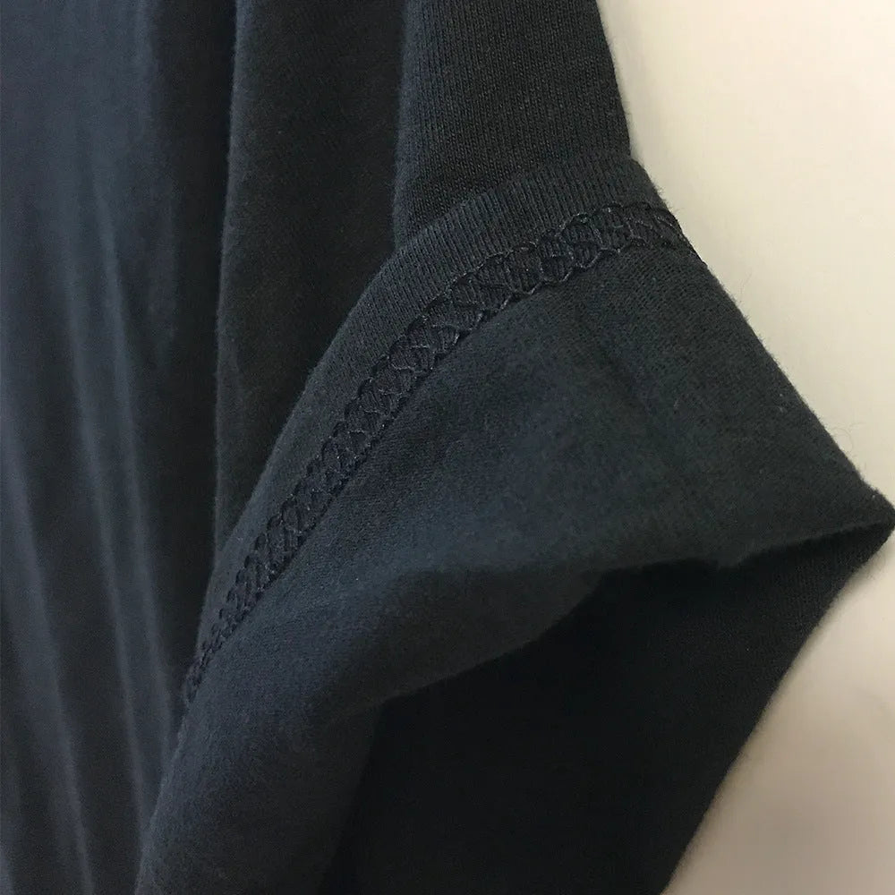 A loose fit men's cotton t-shirt with a short sleeve and a printed humour design, shown in a black colour variant.